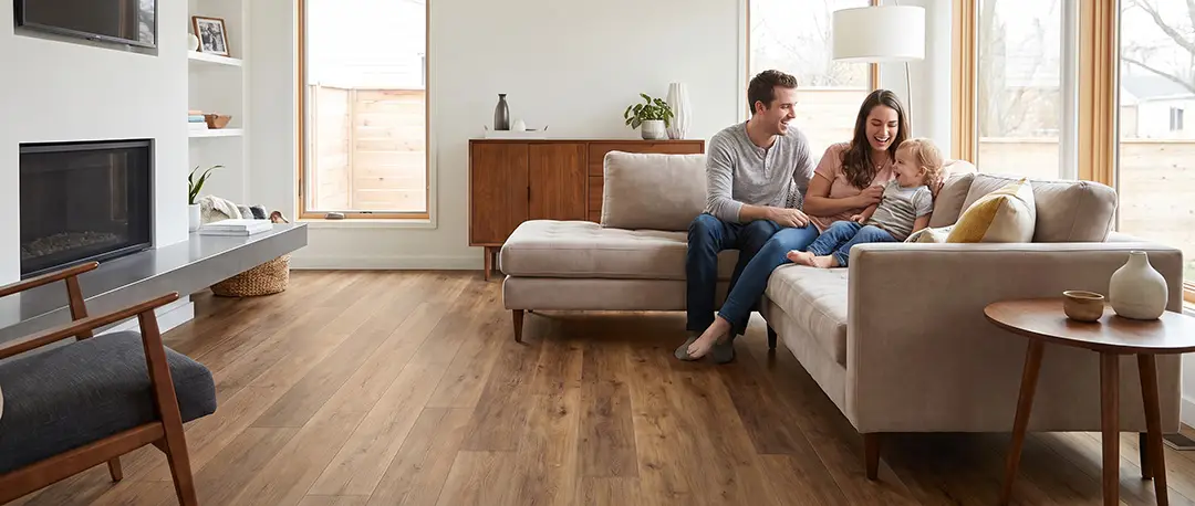 Family enjoying luxury vinyl plank flooring